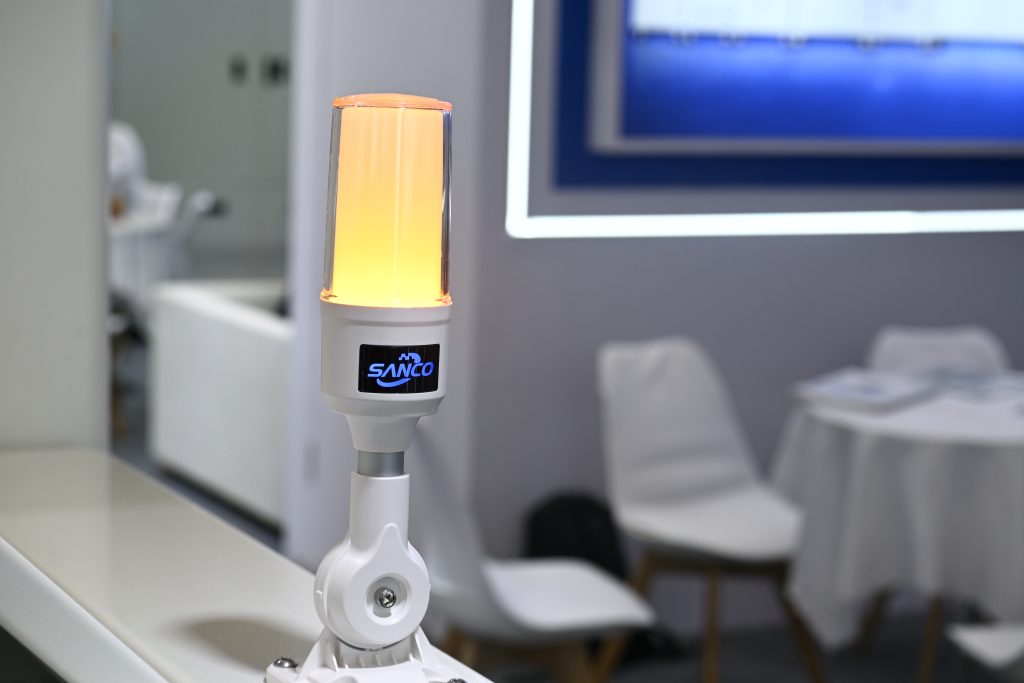 Visitors and SANCO at the exhibition booth