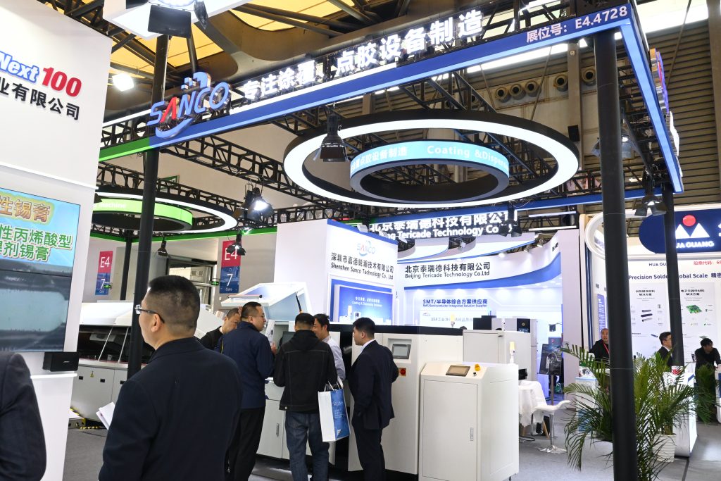 SANCO team communicating with customers at the exhibition