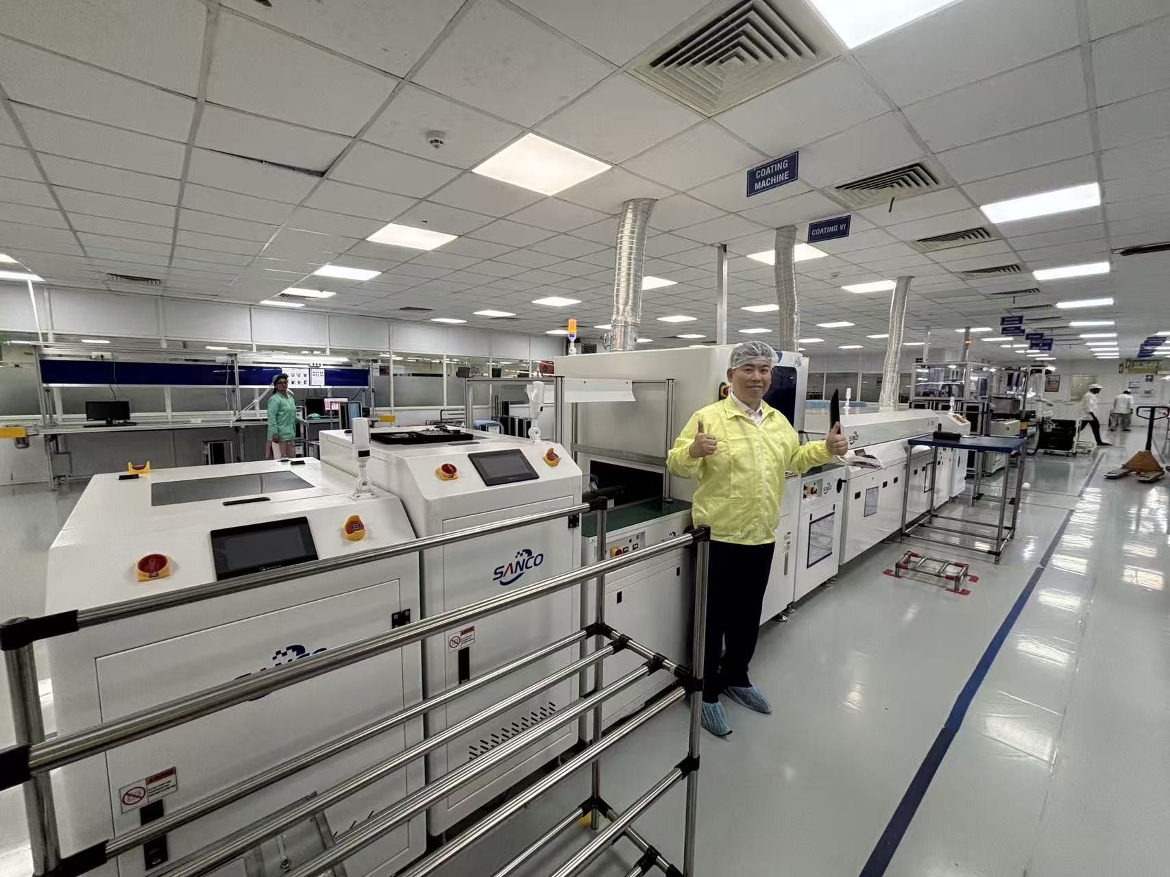Compact inline coating machine design